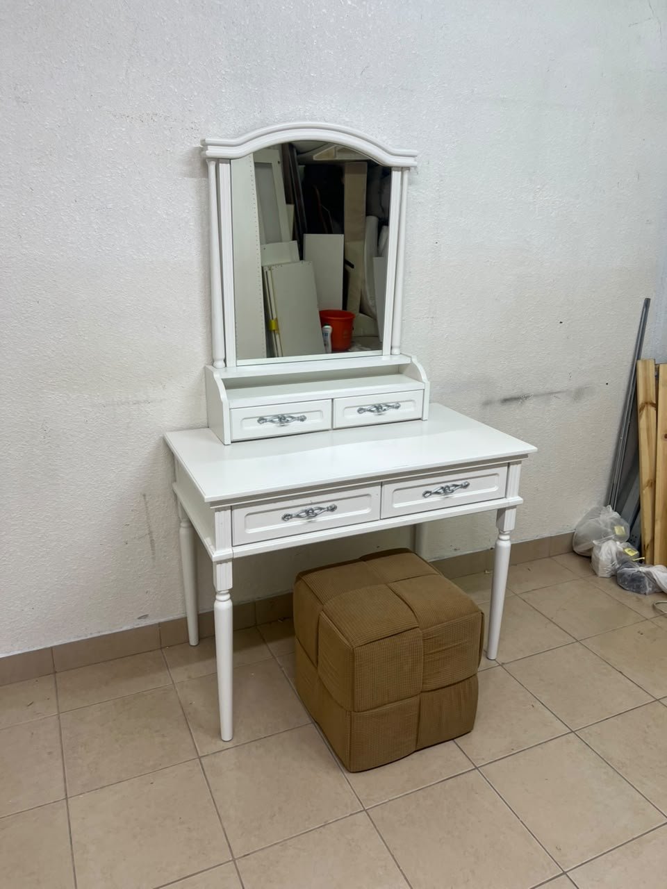 A white vanity table featuring a mirror and both upper and lower drawers, accompanied by a square brown stool upholstered in mesh fabric. - Image 2