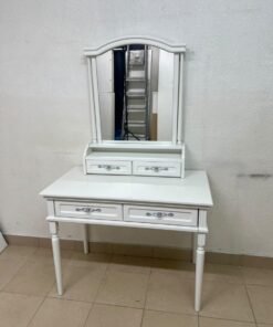 A white vanity table featuring a mirror and both upper and lower drawers, accompanied by a square brown stool upholstered in mesh fabric. - Image 4