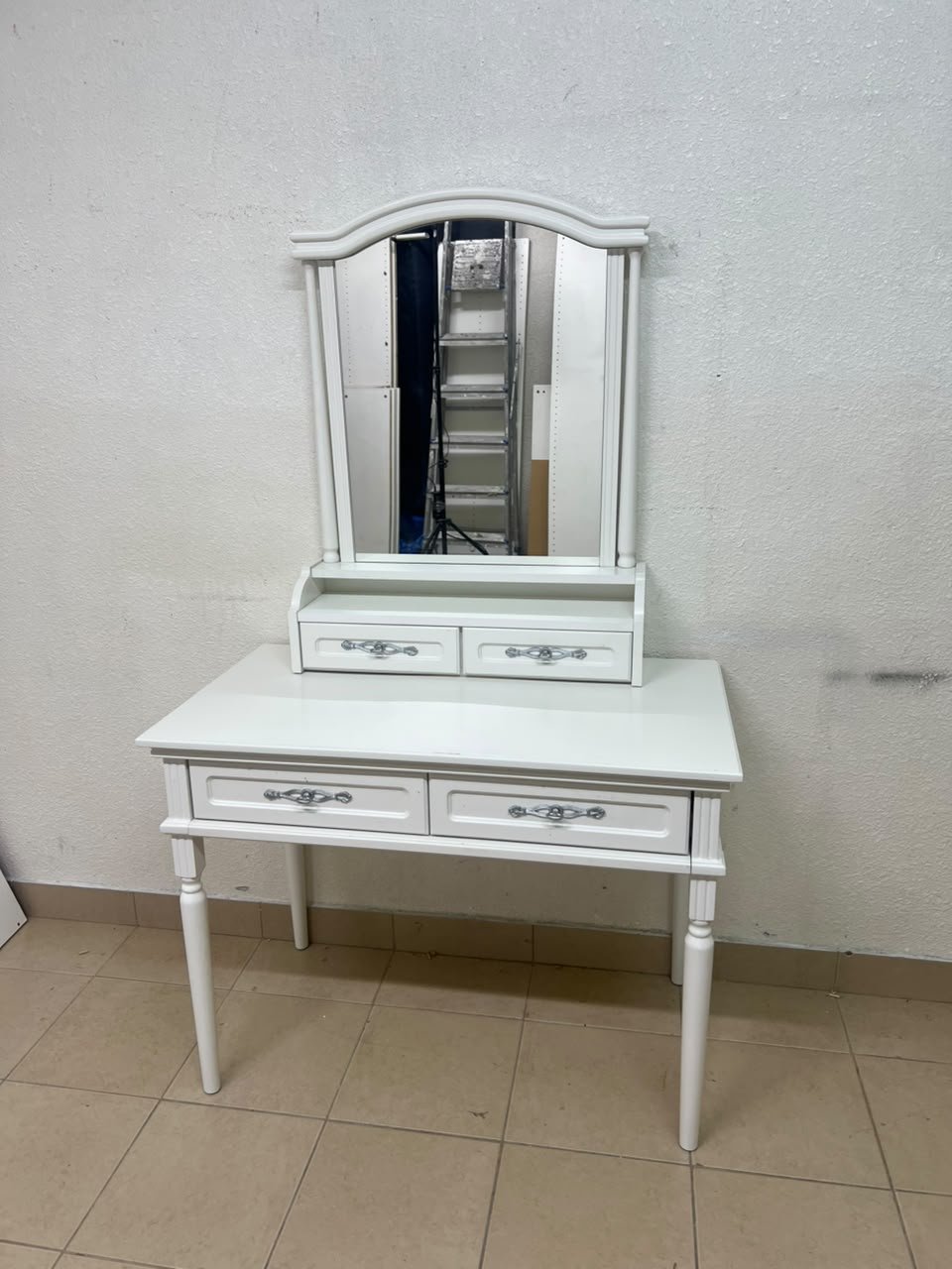A white vanity table featuring a mirror and both upper and lower drawers, accompanied by a square brown stool upholstered in mesh fabric. - Image 4
