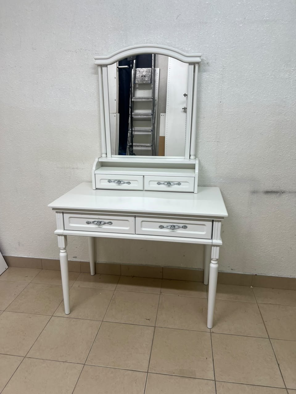 A white vanity table featuring a mirror and both upper and lower drawers, accompanied by a square brown stool upholstered in mesh fabric. - Image 5