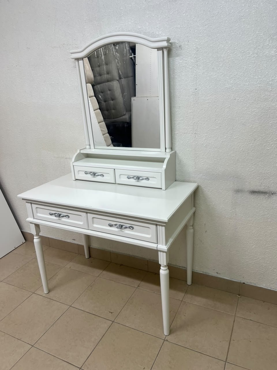 A white vanity table featuring a mirror and both upper and lower drawers, accompanied by a square brown stool upholstered in mesh fabric. - Image 8