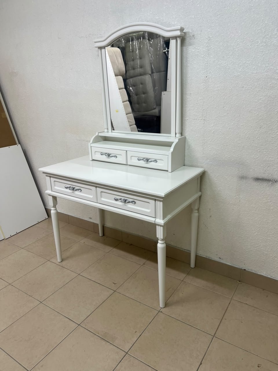 A white vanity table featuring a mirror and both upper and lower drawers, accompanied by a square brown stool upholstered in mesh fabric. - Image 9