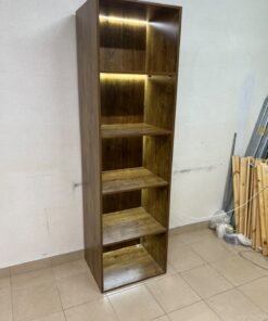 A vertical, 5-shelf wooden storage organizer featuring an open-back cube design and built-in LED lighting that adds a warm, modern touch to the upper shelves.