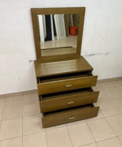 A wooden drawer unit (dressing table) featuring three drawers and metal handles, accompanied by a square mirror with a matching wooden frame—resembling designs found at brands like Pan Emirates or Home Centre. - Image 2
