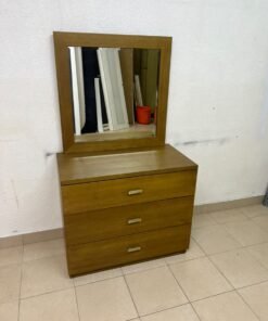 A wooden drawer unit (dressing table) featuring three drawers and metal handles, accompanied by a square mirror with a matching wooden frame—resembling designs found at brands like Pan Emirates or Home Centre. - Image 4