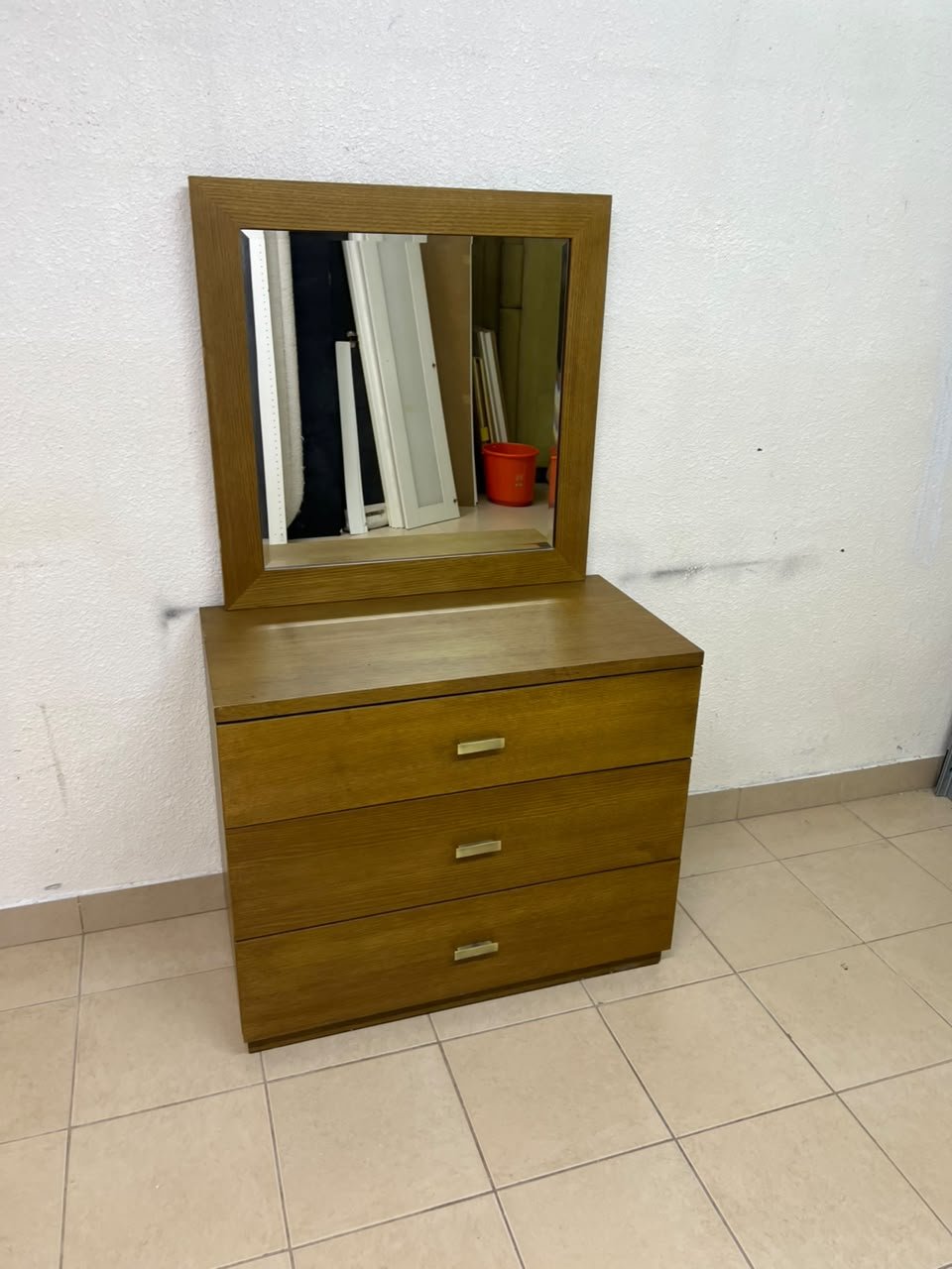 A wooden drawer unit (dressing table) featuring three drawers and metal handles, accompanied by a square mirror with a matching wooden frame—resembling designs found at brands like Pan Emirates or Home Centre. - Image 4