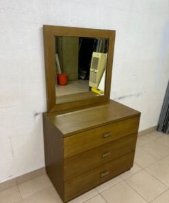 A wooden drawer unit (dressing table) featuring three drawers and metal handles, accompanied by a square mirror with a matching wooden frame—resembling designs found at brands like Pan Emirates or Home Centre. - Image 7