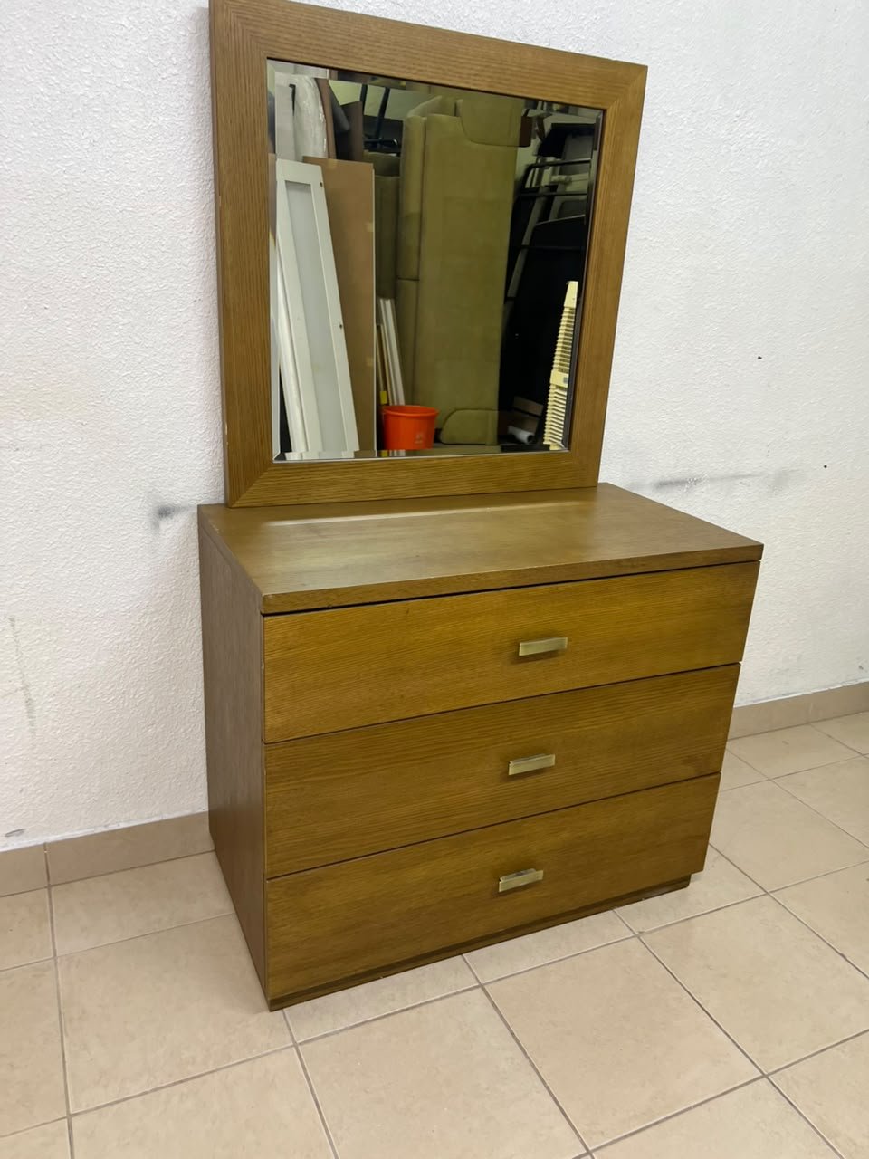A wooden drawer unit (dressing table) featuring three drawers and metal handles, accompanied by a square mirror with a matching wooden frame—resembling designs found at brands like Pan Emirates or Home Centre. - Image 8