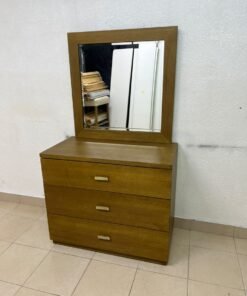 A wooden drawer unit (dressing table) featuring three drawers and metal handles, accompanied by a square mirror with a matching wooden frame—resembling designs found at brands like Pan Emirates or Home Centre. - Image 9