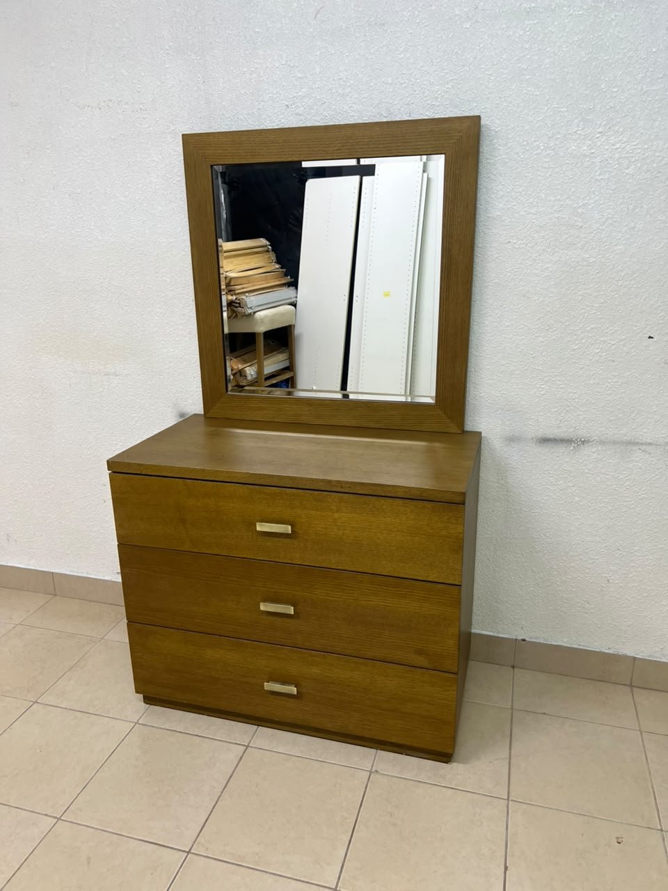 A wooden drawer unit (dressing table) featuring three drawers and metal handles, accompanied by a square mirror with a matching wooden frame—resembling designs found at brands like Pan Emirates or Home Centre. - Image 9