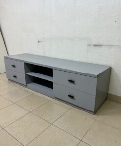 A grey TV stand featuring a modern design and side drawers equipped with stylish black handles. - Image 9