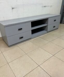 A grey TV stand featuring a modern design and side drawers equipped with stylish black handles. - Image 10