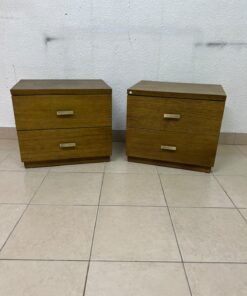 Two wooden side tables in a warm brown hue, featuring an elegant design with two drawers and distinctive metal handles. - Image 2