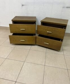 Two wooden side tables in a warm brown hue, featuring an elegant design with two drawers and distinctive metal handles. - Image 3