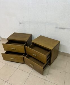 Two wooden side tables in a warm brown hue, featuring an elegant design with two drawers and distinctive metal handles. - Image 8