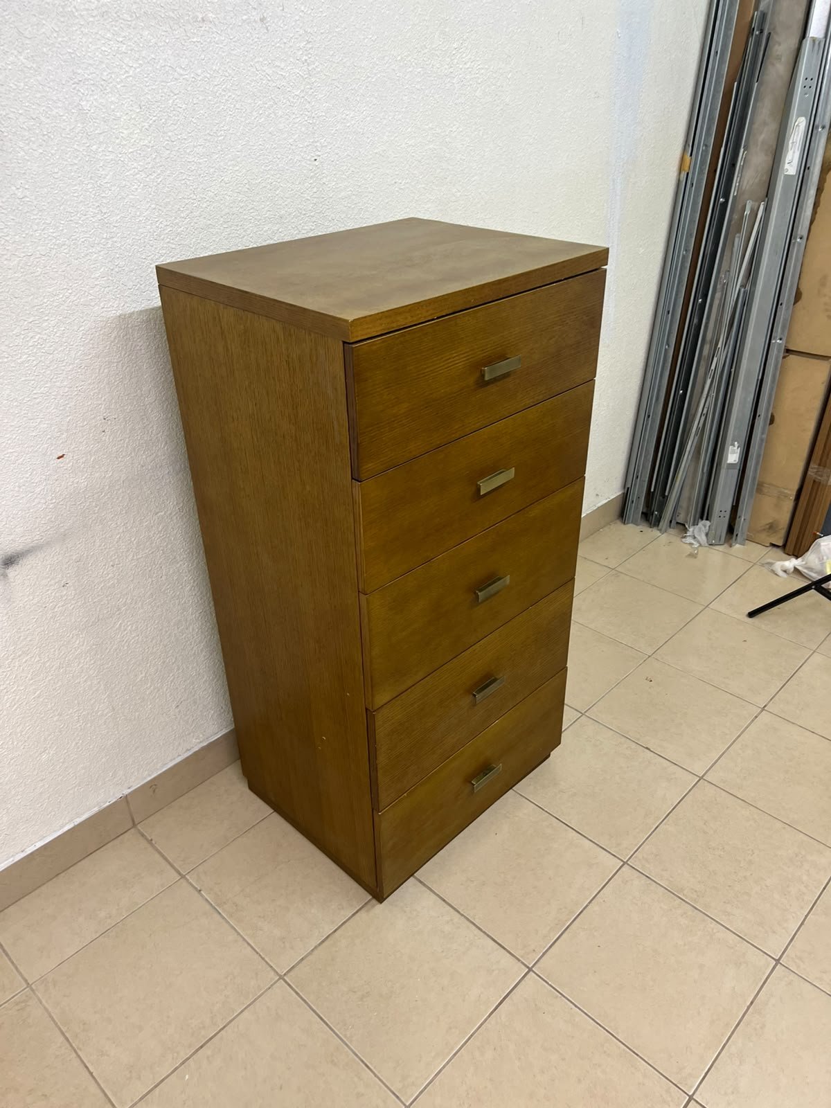 A tall, classic-style wooden chest of drawers, featuring elegant gold metal handles neatly arranged on each drawer. - Image 2