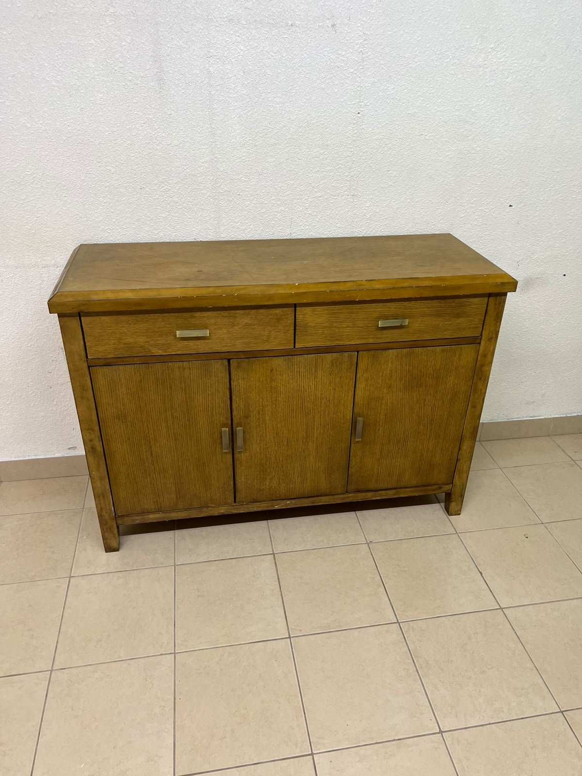A practical wooden sideboard featuring two upper drawers and three doors fitted with stylish metal handles. - Image 9