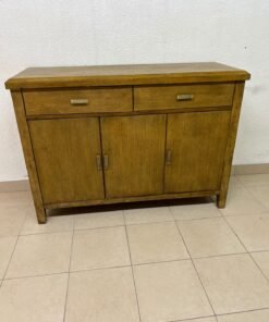 A practical wooden sideboard featuring two upper drawers and three doors fitted with stylish metal handles.