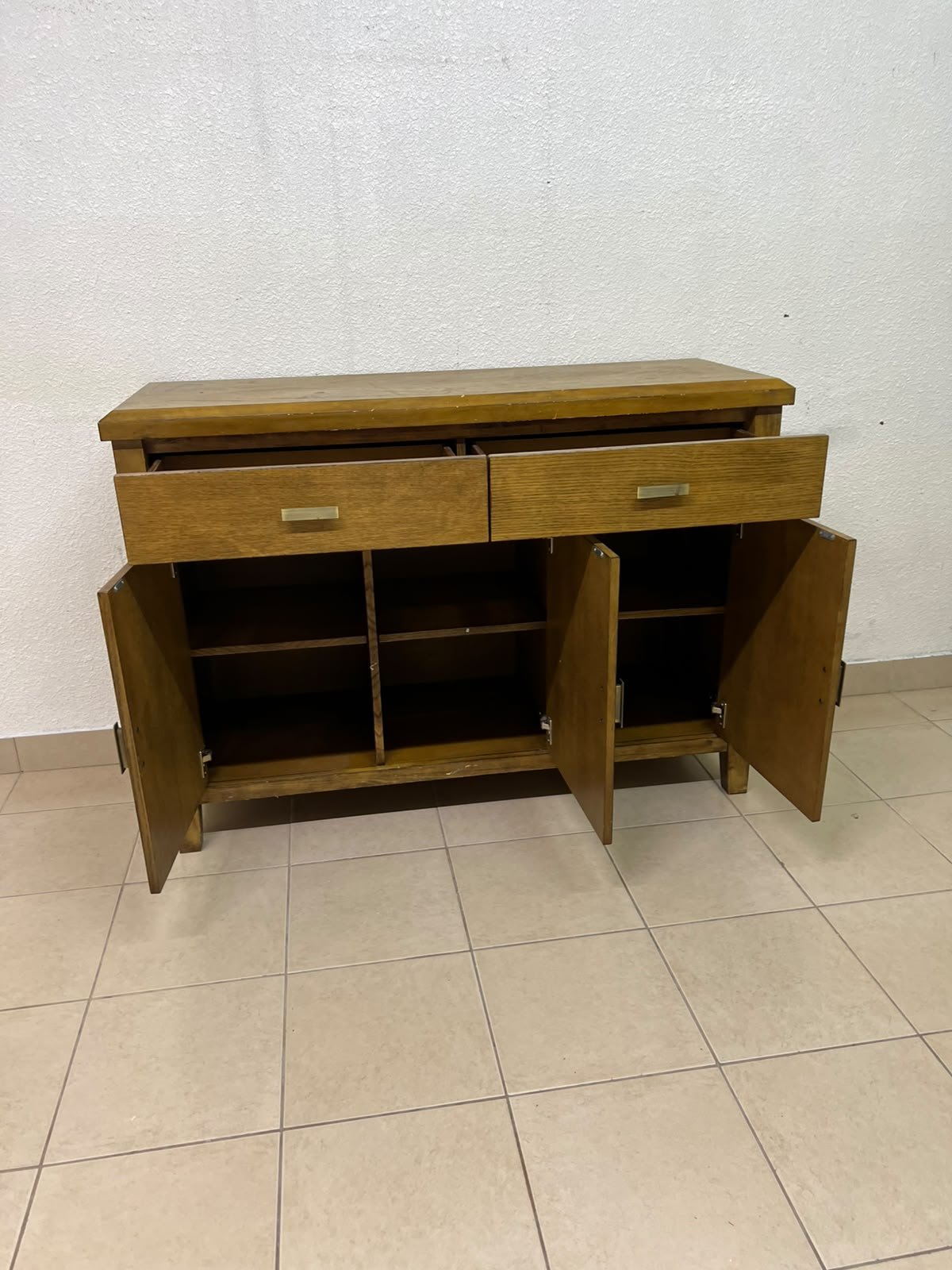A practical wooden sideboard featuring two upper drawers and three doors fitted with stylish metal handles. - Image 7