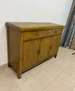 A practical wooden sideboard featuring two upper drawers and three doors fitted with stylish metal handles. - Image 8