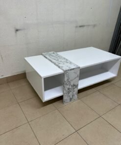 A modern living room coffee table combining white with a faux-marble finish. - Image 9
