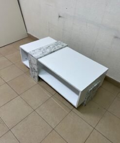 A modern living room coffee table combining white with a faux-marble finish. - Image 2