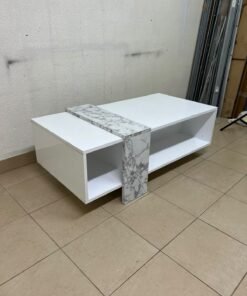 A modern living room coffee table combining white with a faux-marble finish. - Image 3