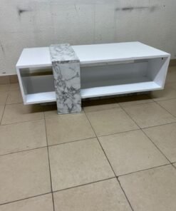 A modern living room coffee table combining white with a faux-marble finish. - Image 6