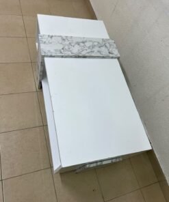A modern living room coffee table combining white with a faux-marble finish. - Image 7