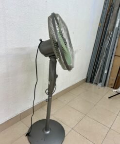 A Sanyo-branded grey pedestal fan featuring light green blades and a circular base. - Image 3