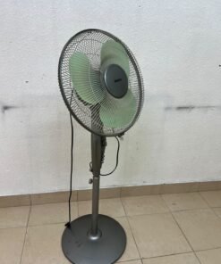 A Sanyo-branded grey pedestal fan featuring light green blades and a circular base. - Image 6
