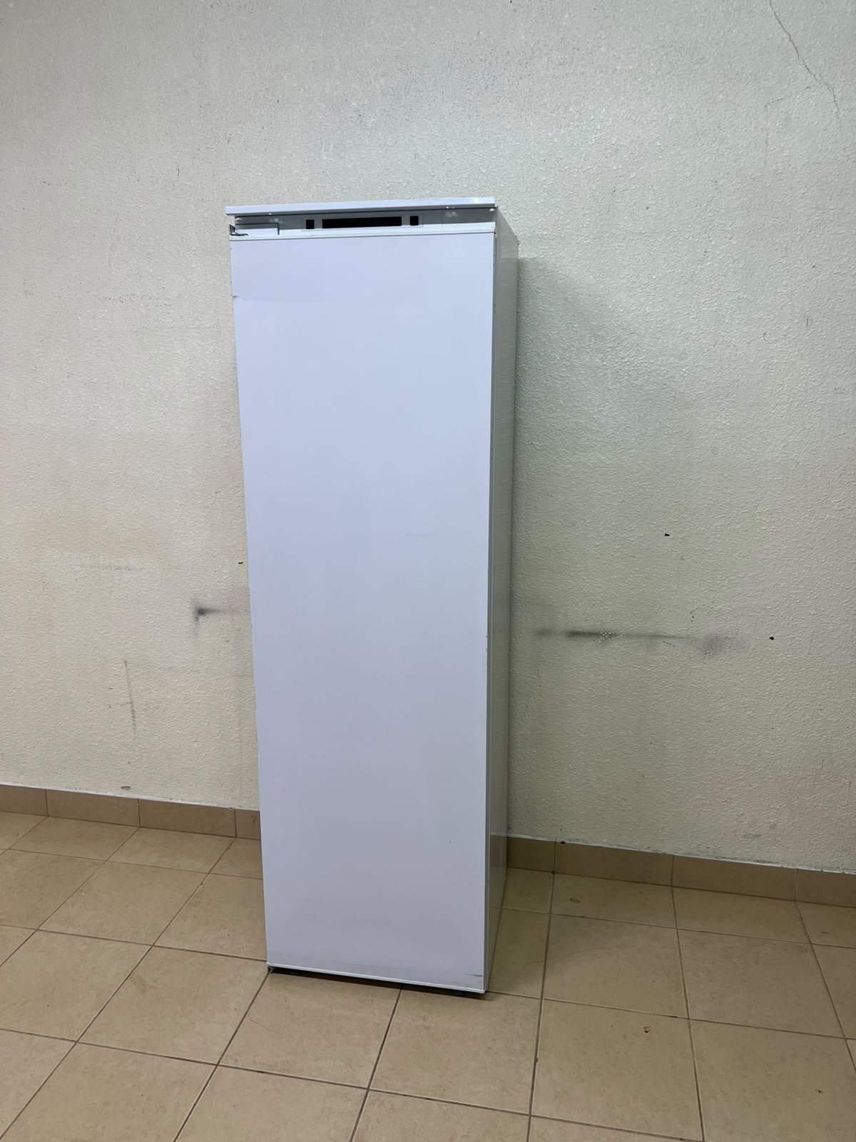 A white built-in upright freezer featuring multiple transparent storage drawers. - Image 7