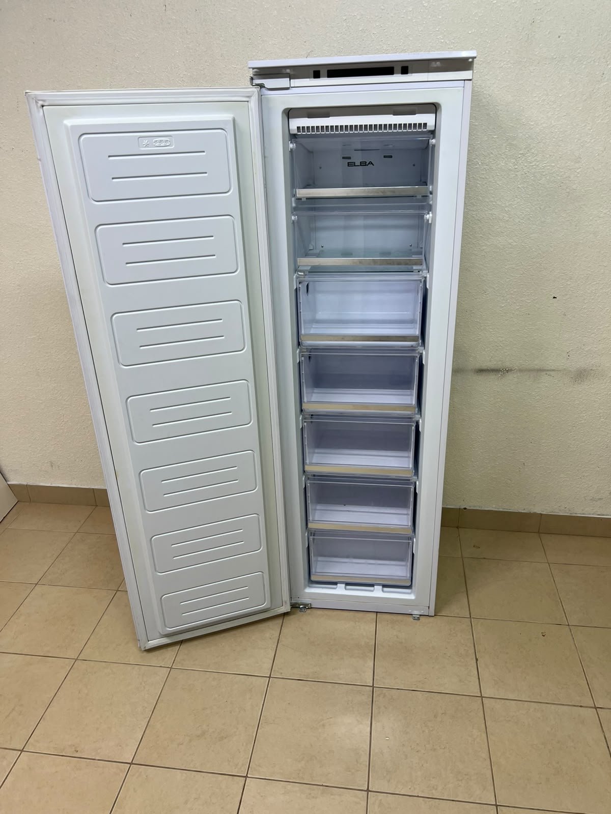 A white built-in upright freezer featuring multiple transparent storage drawers. - Image 3