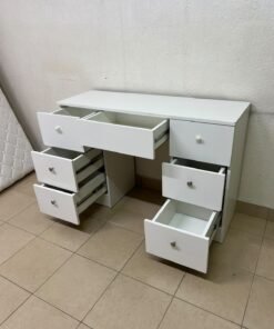 A white vanity desk featuring a modern, practical design, complete with seven storage drawers and elegant round handles. - Image 6