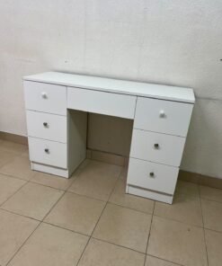 A white vanity desk featuring a modern, practical design, complete with seven storage drawers and elegant round handles. - Image 7
