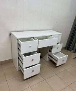 A white vanity desk featuring a modern, practical design, complete with seven storage drawers and elegant round handles. - Image 9