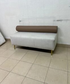 The light-gray upholstered seat, featuring a brown cylindrical backrest and gold legs, is a stylish, modern piece of furniture that adds a distinctive touch to the décor. - Image 7