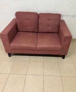A red or dark pink two-seater fabric sofa featuring wide armrests and back cushions adorned with a checkered pattern. - Image 6