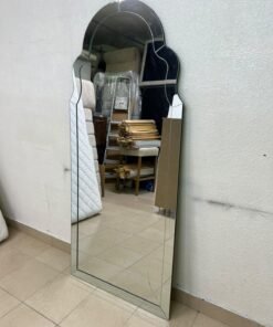 The arched, beveled-edge floor mirror—resembling the Bonnie mirror from Centrepoint—features elegant curved details that add visual depth and a sophisticated touch to any space. - Image 2