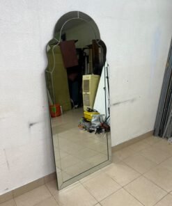 The arched, beveled-edge floor mirror—resembling the Bonnie mirror from Centrepoint—features elegant curved details that add visual depth and a sophisticated touch to any space. - Image 3