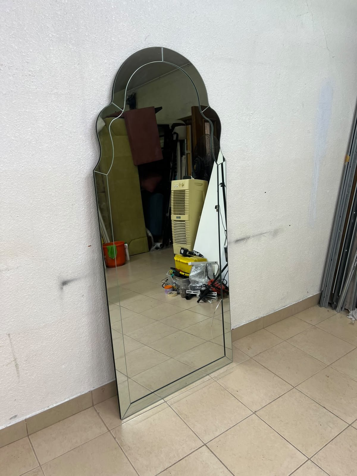 The arched, beveled-edge floor mirror—resembling the Bonnie mirror from Centrepoint—features elegant curved details that add visual depth and a sophisticated touch to any space. - Image 3