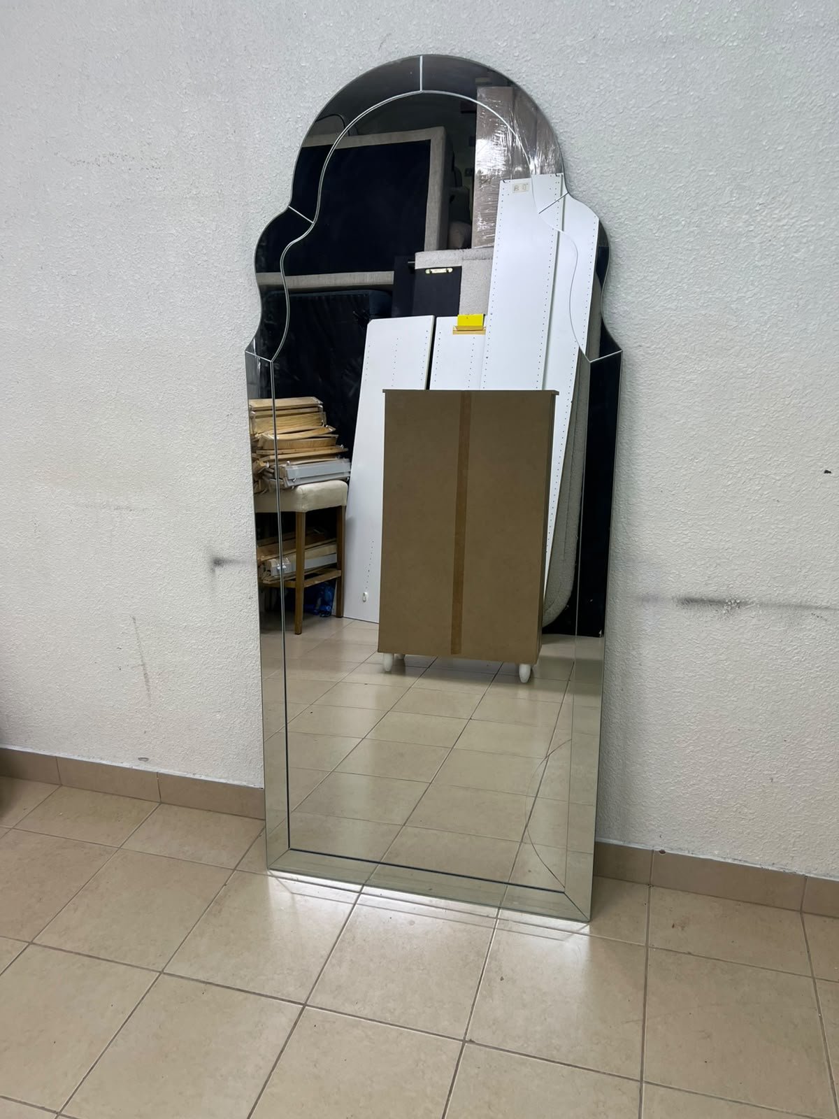The arched, beveled-edge floor mirror—resembling the Bonnie mirror from Centrepoint—features elegant curved details that add visual depth and a sophisticated touch to any space. - Image 4