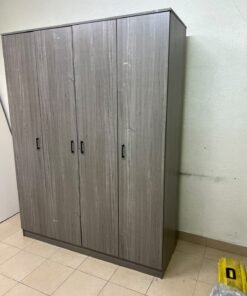 The image shows the Jamora four-door wardrobe from Danube Home, featuring a warm grey color and a practical design with hinged doors and simple black handles. - Image 8