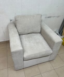 The single chair, upholstered in light gray fabric, resembles modern seating designs characterized by wide, comfortable armrests. - Image 2