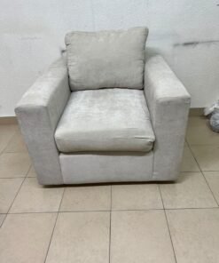 The single chair, upholstered in light gray fabric, resembles modern seating designs characterized by wide, comfortable armrests. - Image 8