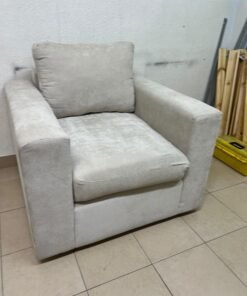 The single chair, upholstered in light gray fabric, resembles modern seating designs characterized by wide, comfortable armrests. - Image 9