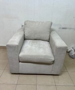 The single chair, upholstered in light gray fabric, resembles modern seating designs characterized by wide, comfortable armrests. - Image 4
