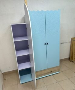 The photo shows a children's wardrobe with a distinctive nautical design in blue and white with wooden details and wave-like top edges. - Image 10