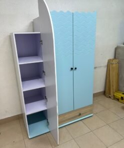 The photo shows a children's wardrobe with a distinctive nautical design in blue and white with wooden details and wave-like top edges. - Image 6