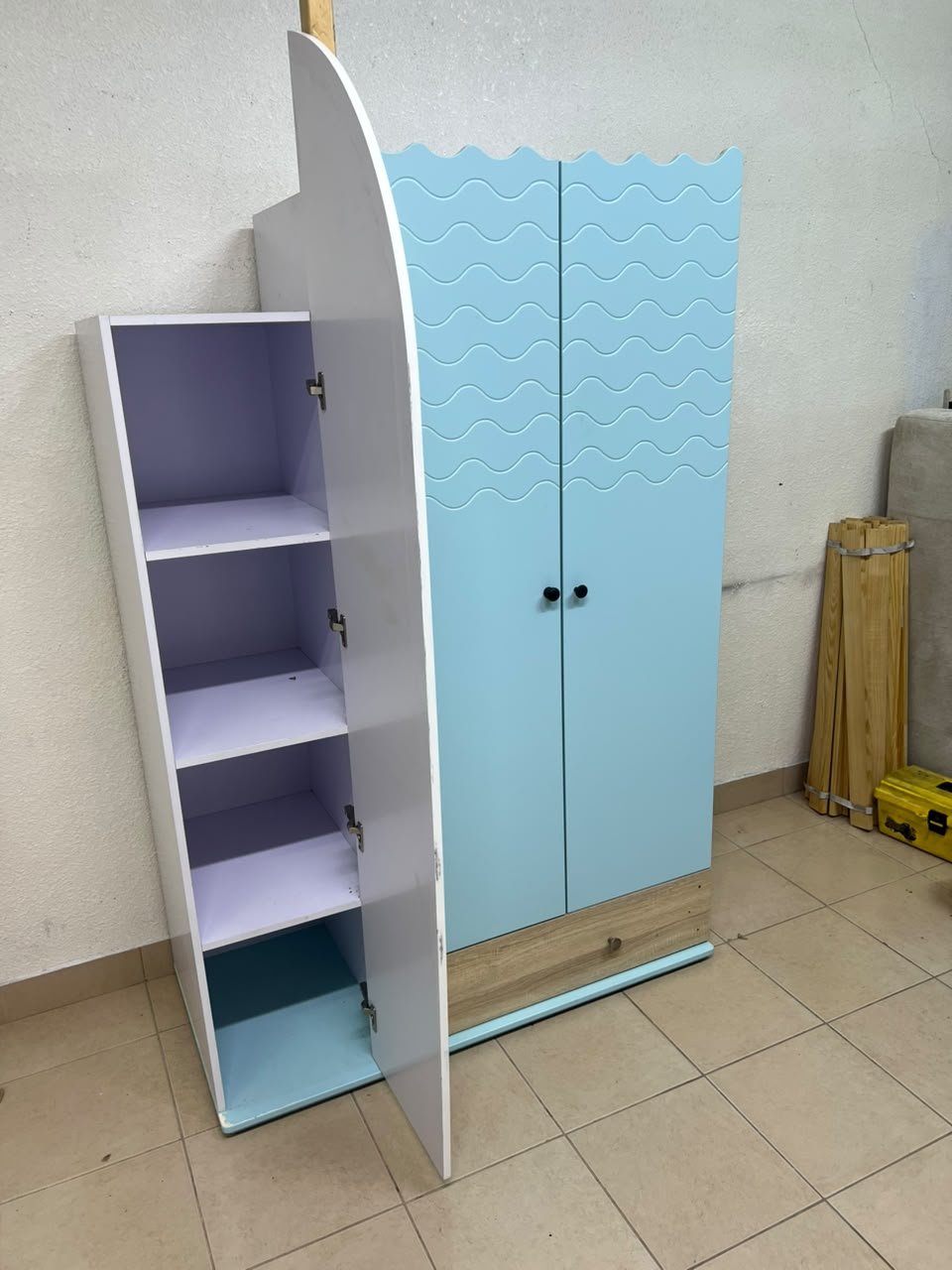 The photo shows a children's wardrobe with a distinctive nautical design in blue and white with wooden details and wave-like top edges. - Image 6